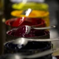 Paint used to color zipper sliders is shown during production at the UCAN Zipper manufacturing facility in Los Angeles. | BLOOMBERG