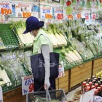 Vegetable prices are higher than regular years this month due to a lack of sunny weather as the rainy season dragged on. | KYODO
