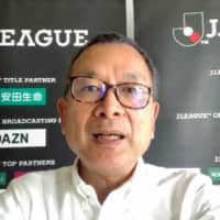 J. League Chairman Mitsuru Murai speaks to reporters following a meeting of the NPB-J. League joint coronavirus task force on Monday. | KYODO