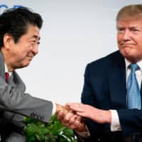 If U.S. President Donald Trump is re-elected, Washington is expected to push Tokyo to shoulder a bigger burden to support U.S. forces stationed in Japan. | ERIN SCHAFF / THE NEW YORK TIMES
