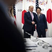 A Trump second term might see the U.S. increasing pressure on Tokyo to line up behind various specific punitive policies directed at China. | ERIN SCHAFF / THE NEW YORK TIMES