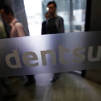 Three men arrested Wednesday on suspicion of making fraudulent applications for government coronavirus funds received the money from a government program to distribute more than $20 billion in aid, which was contracted to a not-for-profit group linked to advertising giant Dentsu Group Inc, police said. | REUTERS