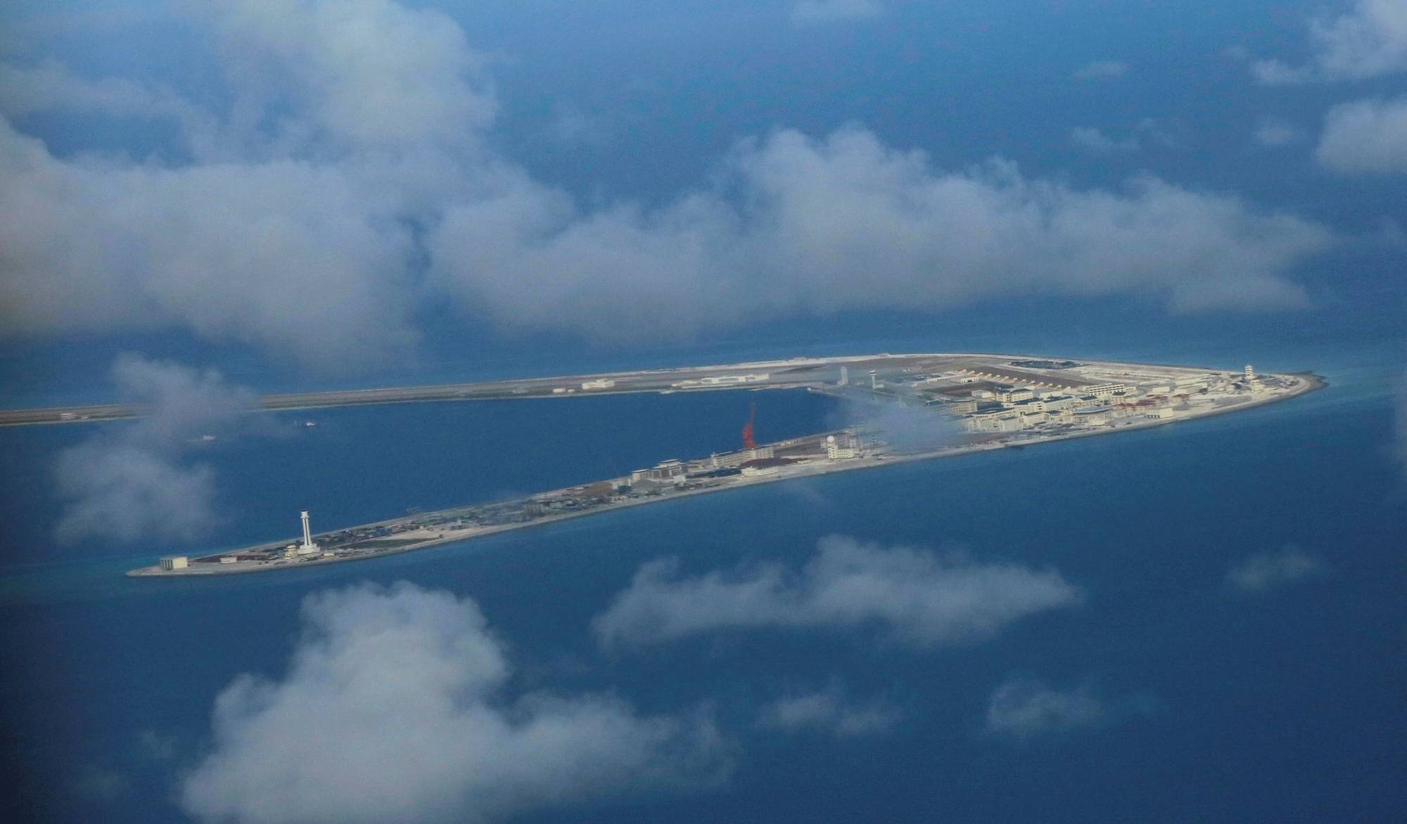 Chinese-held Subi Reef, a man-made island in the Spratly chain in the disputed South China Sea, is seen in April 2017.  | POOL / VIA REUTERS