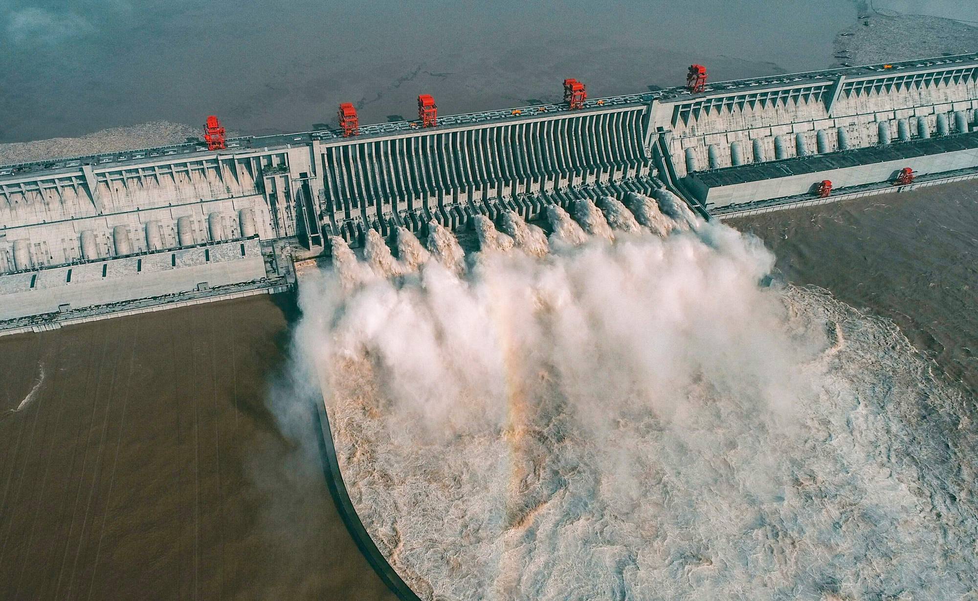 This aerial photo taken on Aug. 23 shows water being released from China's Three Gorges Dam in Yichang, Hubei province. | AFP-JIJI