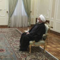 Iranian President Hassan Rouhani meets Director General of International Atomic Energy Agency Rafael Mariano Grossi in Tehran on Wednesday.  | IRANIAN PRESIDENCY OFFICE / VIA AP