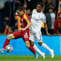 Galatasaray\'s Yuto Nagatomo competes against Real Madrid\'s Rodrygo during a Champions League match on Oct. 22, 2019, in Istanbul. | REUTERS