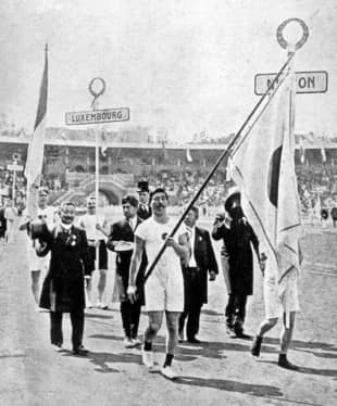 The uniform and spikes of sprinter Yahiko Mishima (center), Japan's flagbearer at the 1912 Stockholm Olympics, is among items of historical value in the collection of the Prince Chichibu Memorial Sports Museum and Library. | KYODO