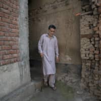 Peerzada Lateef Shah, who narrowly survived an assassination attempt last year by Kashmiri separatists who regarded him as a traitor, in Mitrigam, India | SHOWKAT NANDA/THE NEW YORK TIMES