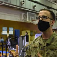 Tech. Sgt. Nathaniel Nelson, who oversees the Samurai Fitness Center at Yokota Air Base, said a space that used to be a basketball court has been repurposed to accommodate equipment from other areas. | TOMOHIRO OSAKI
