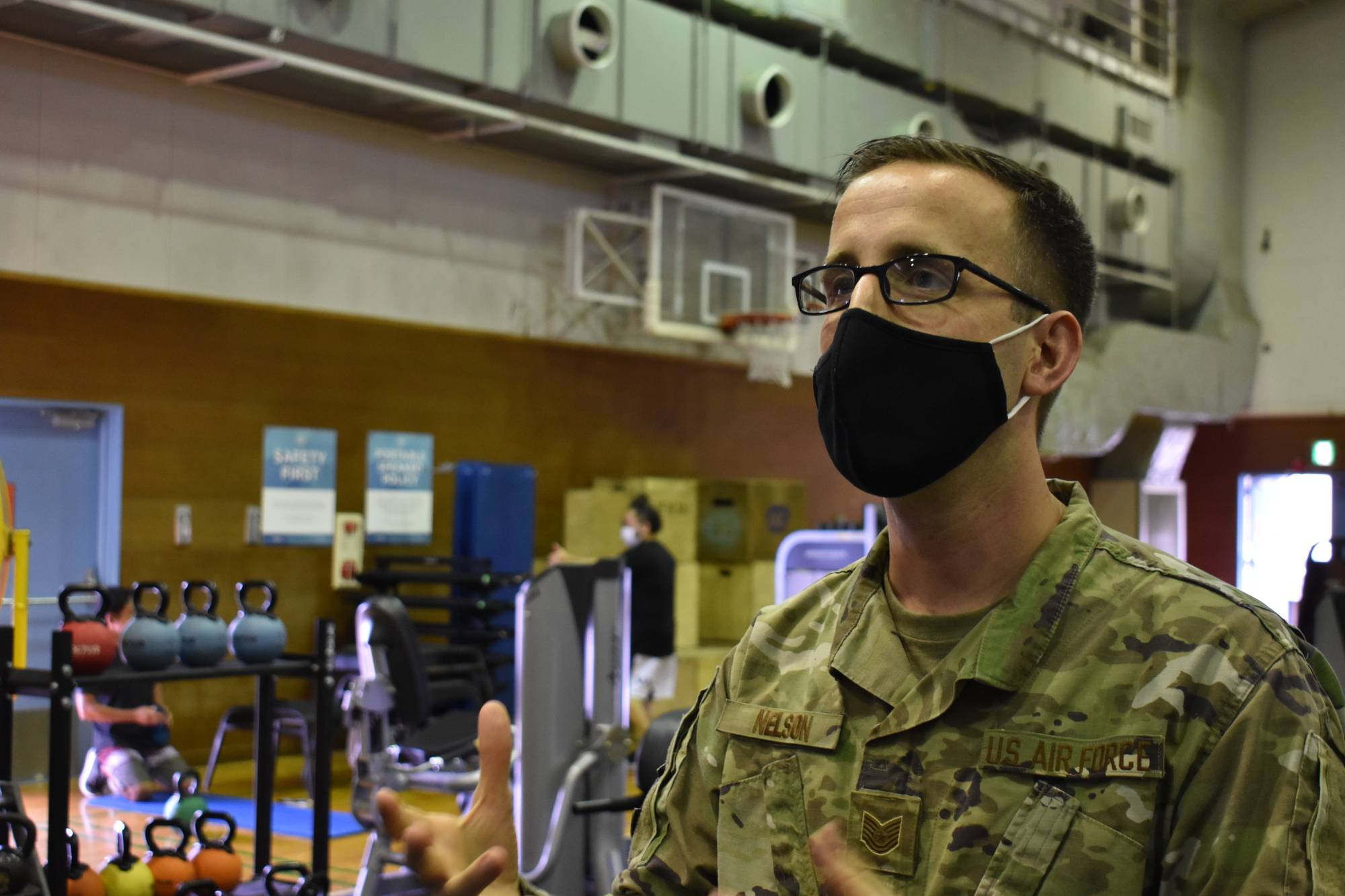 Tech. Sgt. Nathaniel Nelson, who oversees the Samurai Fitness Center at Yokota Air Base, said a space that used to be a basketball court has been repurposed to accommodate equipment from other areas. | TOMOHIRO OSAKI 