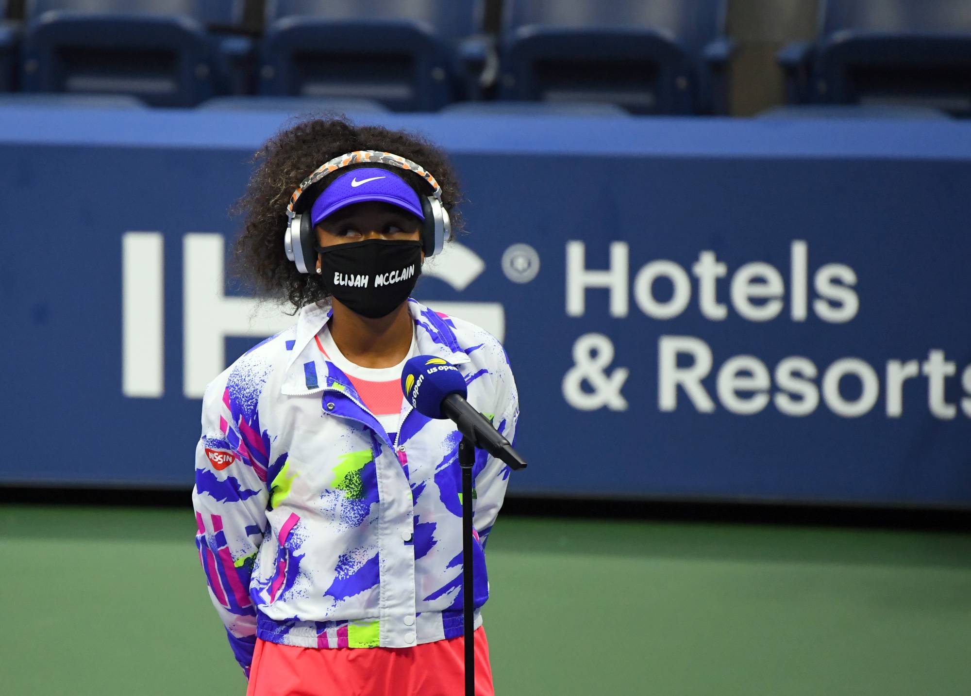 No masking the meaning: Naomi Osaka speaks to the press while wearing a face mask with the name of Elijah McClain written on it. McClain was 23 when he died after being placed in a chokehold by police in Aurora, Colorado, and administered a sedative by paramedics.  | REUTERS