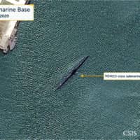 A close-up view of a Romeo-class submarine anchored within the southern section of the bay of the Mayang-do Submarine Base in Mayang-do, North Korea, is seen in a satellite photo taken Friday.  | CSIS / BEYOND PARALLEL / AIRBUS 2020 / VIA REUTERS