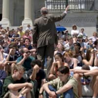 Joe Biden gives a speech about nuclear warfare and Chinese espionage to a group of high school students on the steps of the Capitol in Washington in 1999. | STEPHEN CROWLEY / THE NEW YORK TIMES