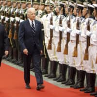 Xi Jinping, then China\'s vice president, attends a welcoming ceremony with then then-U.S. Vice-President Joe Biden at the Great Hall of the People in Beijing in 2011.  | BLOOMBERG
