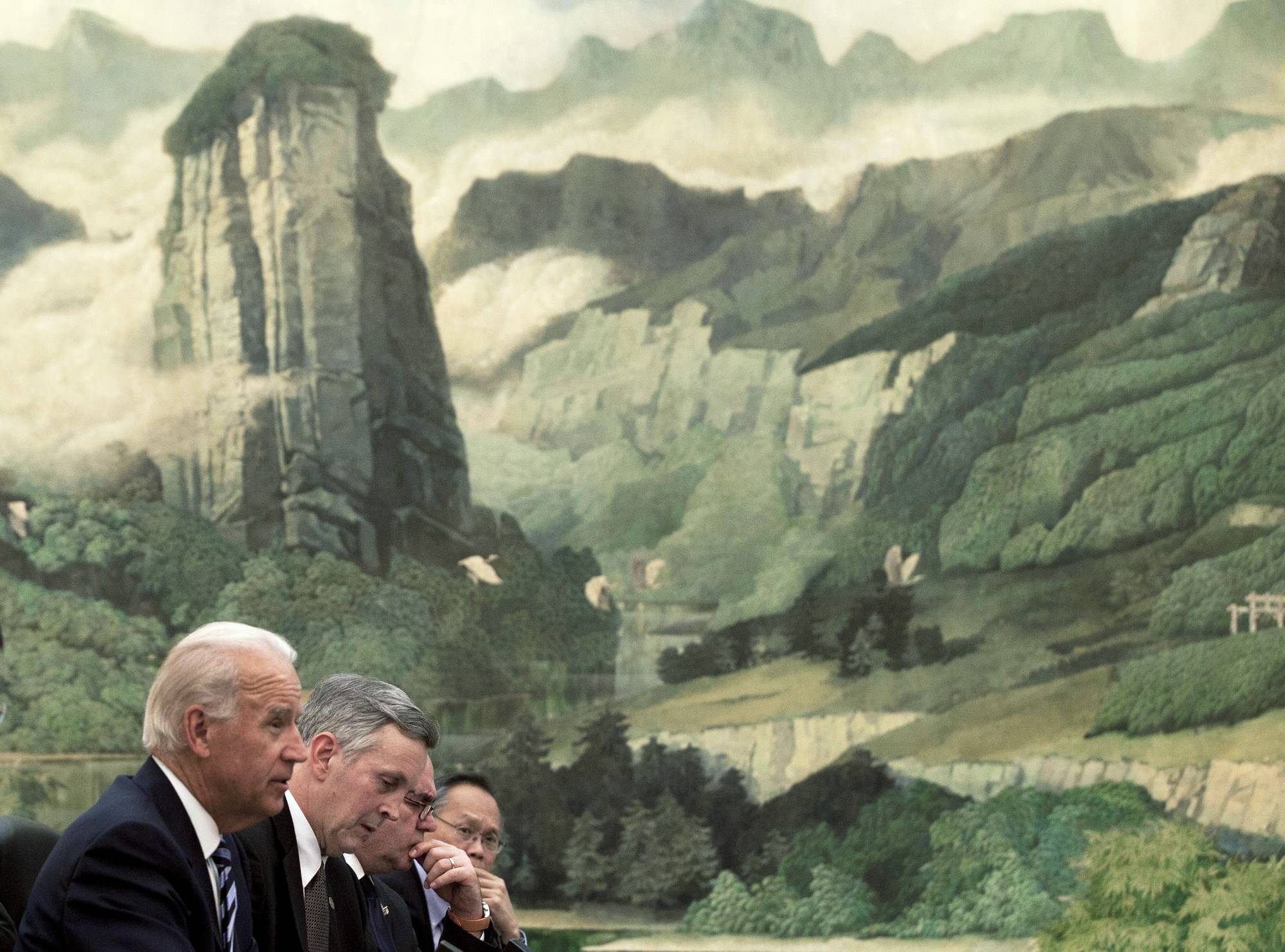 Then-U.S. Vice President Joe Biden speaks during a meeting with China's then-president, Hu Jintao, at the Great Hall of the People in Beijing in 2011. | POOL / VIA REUTERS