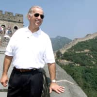 Joe Biden, then the U.S. Senate Foreign Relations Committee Chairman, visits the Great Wall of China at Badaling, north of Beijing, in 2001.  | REUTERS