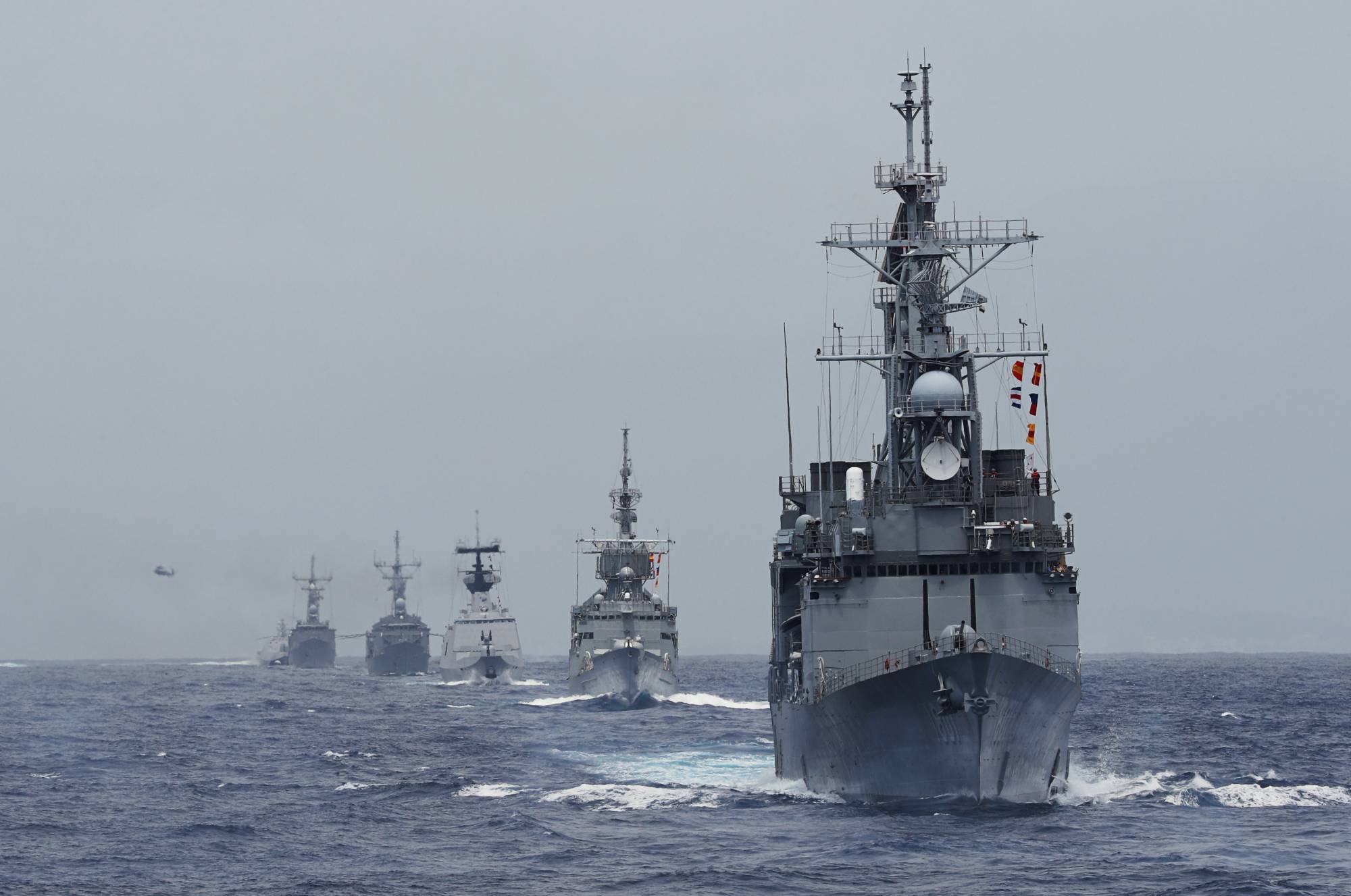 Taiwan's Kee Lung (DDG-1801) guided-missile destroyer (front) and other vessels take part in a military drill near Hualien, Taiwan, in May 2019.   | REUTERS