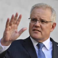 Australia\'s Prime Minister Scott Morrison speaks during a news conference at Parliament House in Canberra on Monday. | AAP / VIA AP