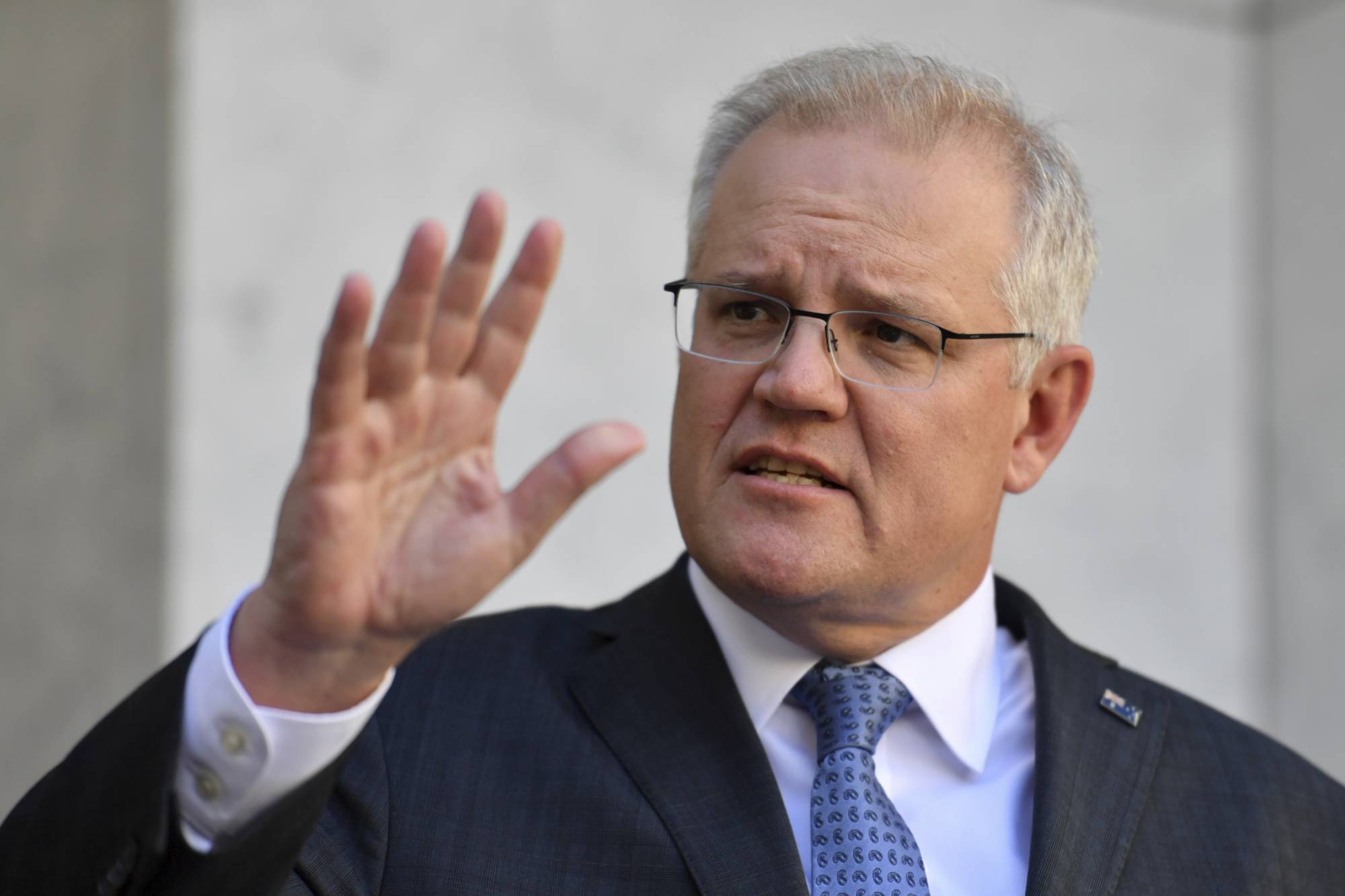 Australia's Prime Minister Scott Morrison speaks during a news conference at Parliament House in Canberra on Monday. | AAP / VIA AP