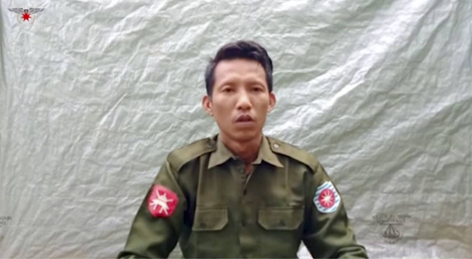Pvt. Myo Win Tun provides a video testimony from an undisclosed location in Myanmar on July 23. Two soldiers who deserted from Myanmar’s army have testified on video that they were instructed by commanding officers to 'shoot all that you see and that you hear” in villages where minority Rohingya Muslims lived, a human rights group said Tuesday.  | ARAKAN ARMY / VIA AP