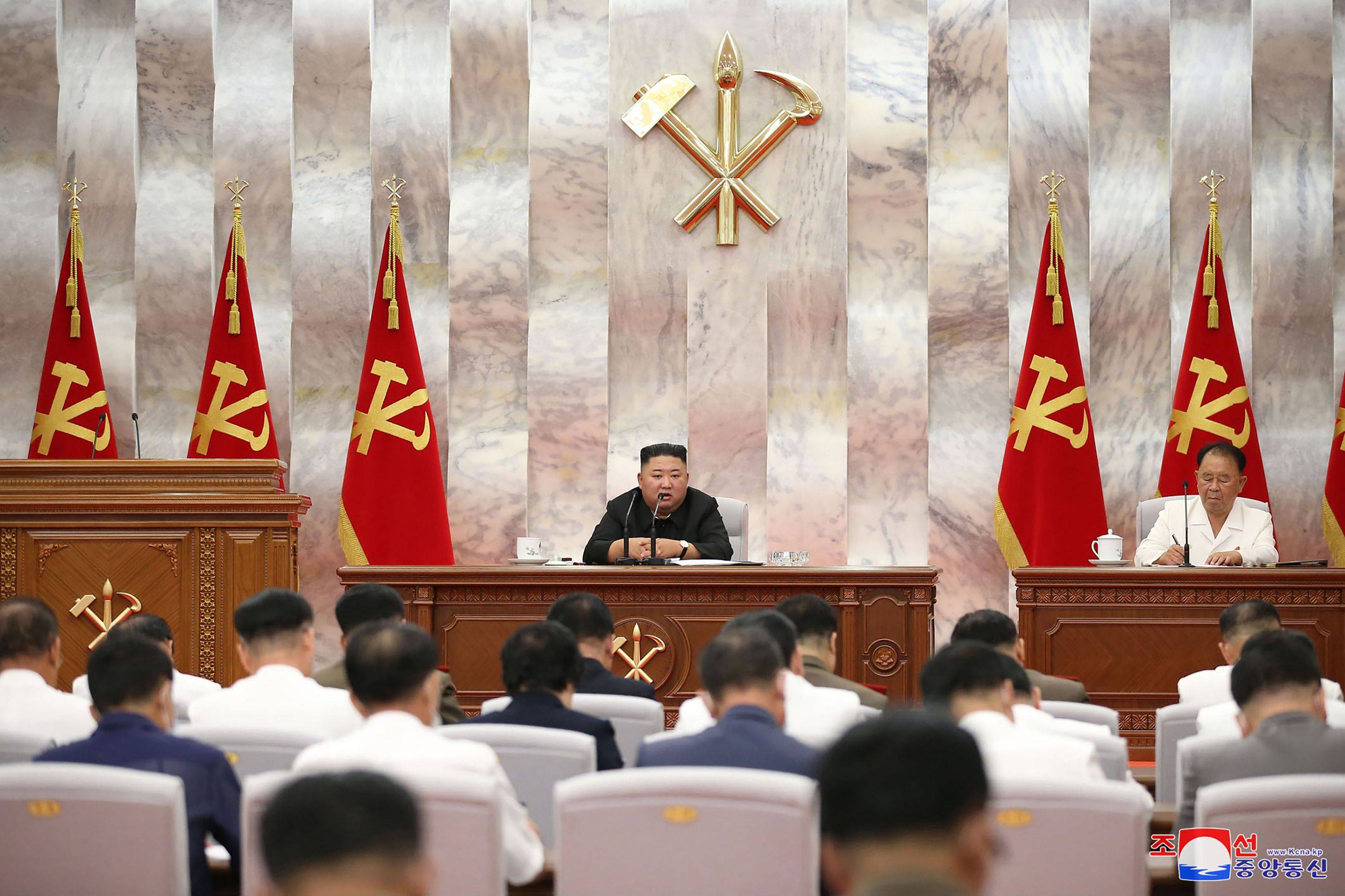 North Korean leader Kim Jong Un attends a conference in Pyongyang on Tuesday on damage inflicted by Typhoon Maysak. | AFP-JIJI