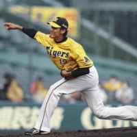 Tigers pitcher Shintaro Fujinami was one of the first NPB players to test positive for the coronavirus in late March. | KYODO