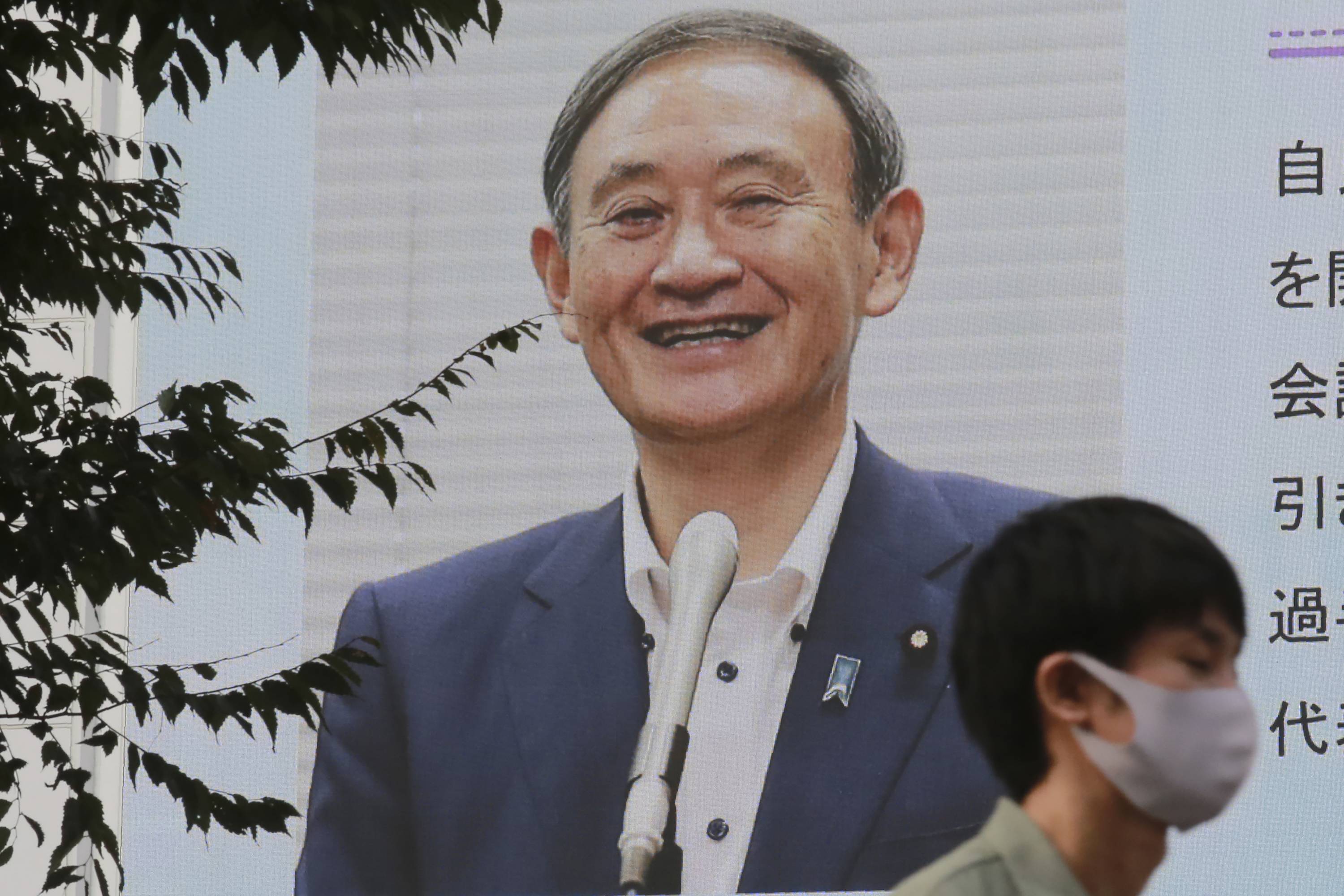 One thing Yoshihide Suga may have gained from his humble roots is sensitivity to the needs of the general public. | AP