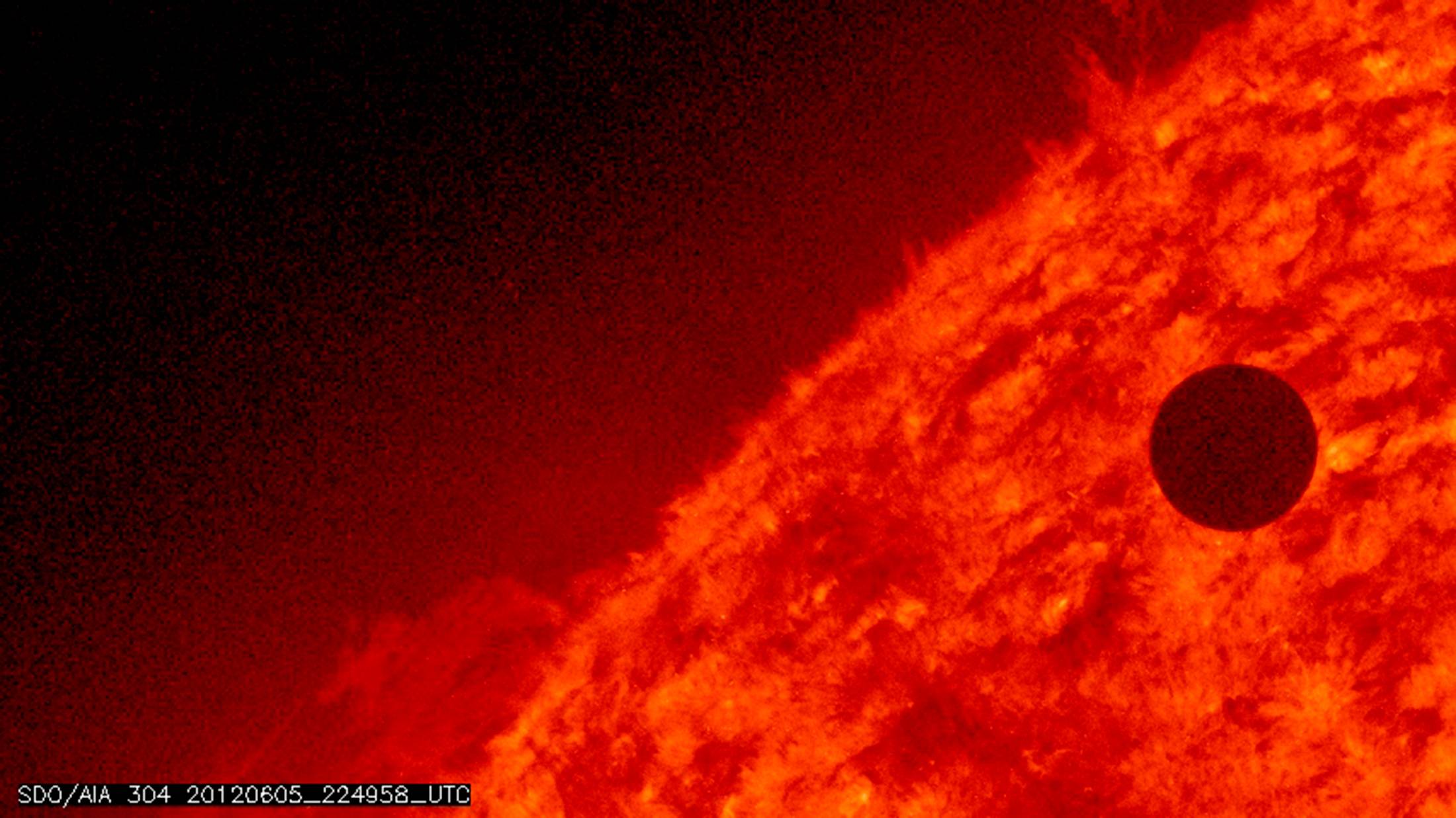 Venus is seen at the start of its transit of the Sun on June 5, 2012. | NASA / AIA / SOLAR DYNAMICS OBSERVATORY / VIA REUTERS 