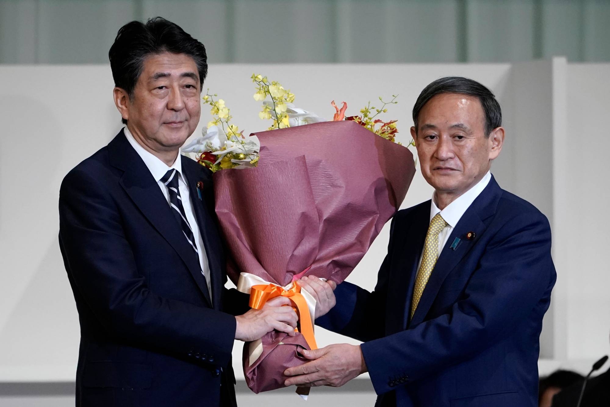 Japanese and international observers are now asking whether the Abe government’s economic-policy course — Abenomics — will change significantly under new Prime Minister Yoshihide Suga | POOL / VIA AFP-JIJI