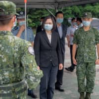 Taiwan President Tsai Ing-wen visits an air defense missile base at an undisclosed location.  | TAIWAN PRESIDENTIAL OFFICE / VIA REUTERS