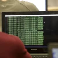 Students attend a cyberdefense class at a school in Poltsamaa, Estonia, in December 2015. | REUTERS