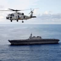 When it comes to security issues, Japan will face U.S. calls to participate in joint naval exercises more often and on a larger scale in order to challenge China’s territorial claims in the South China Sea. | REUTERS