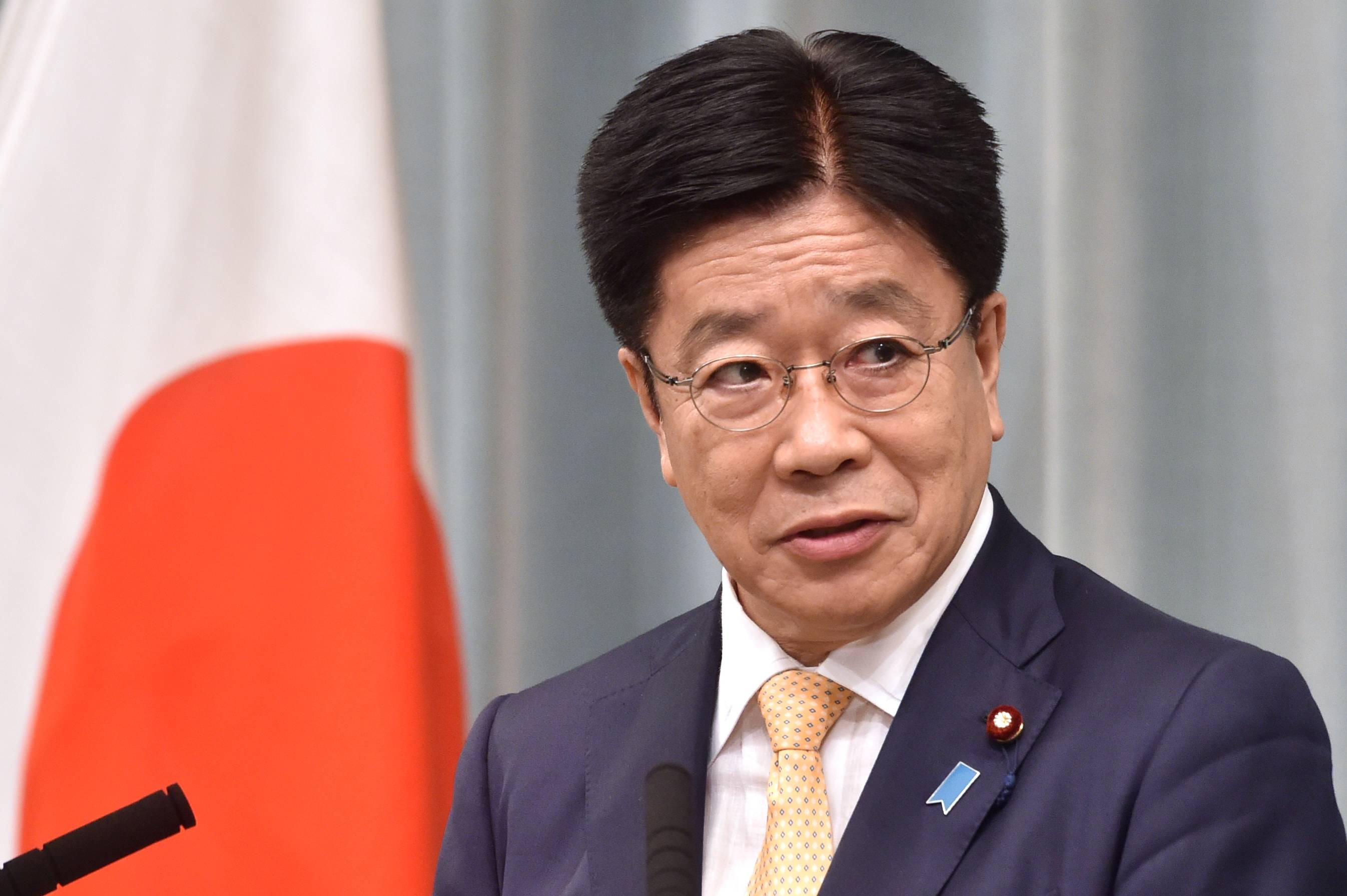 Newly appointed Chief Cabinet Secretary Katsunobu Kato announces Cabinet members during a news conference at the Prime Minister's Office in Tokyo on Wednesday. | AFP-JIJI