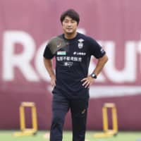 Vissel manager Atsuhiro Miura walks on the field on Thursday in Kobe.  | VISSEL KOBE / VIA KYODO　