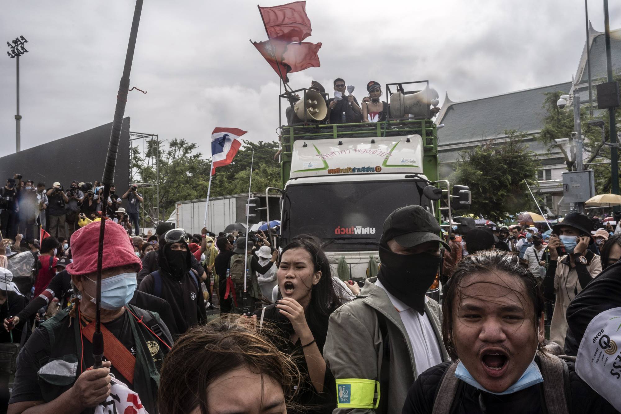 Thousands of protesters gather in front of the Grand Palace in Bangkok on Sept. 19. Women, many of them students, are speaking out against a patriarchy that controls the military, the monarchy and the Buddhist monkhood, Thailand’s most powerful institutions. | Adam Dean / The New York Times