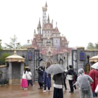 Tokyo Disneyland\'s new area of attractions is shown to media Friday in Urayasu, Chiba Prefecture, with a new castle seen in the background. | KYODO