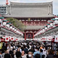 People visit Sensoji temple in Tokyo\'s Asakusa district on Tuesday. | AFP-JIJI
