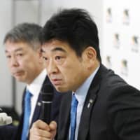 Japan Rugby Top League Chairman Osamu Ota speaks during a news conference on Feb. 26. | KYODO