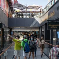 China has staged an uneven recovery, initially driven by strong industrial output yet with recent data showing signs that consumption had started to catch up. | BLOOMBERG