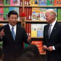 Joe Biden, then the vice president, with Xi Jinping, now China\'s leader, at the International Studies Learning Center in South Gate, California, in February 2012.  | MONICA ALMEDIA / THE NEW YORK TIMES 