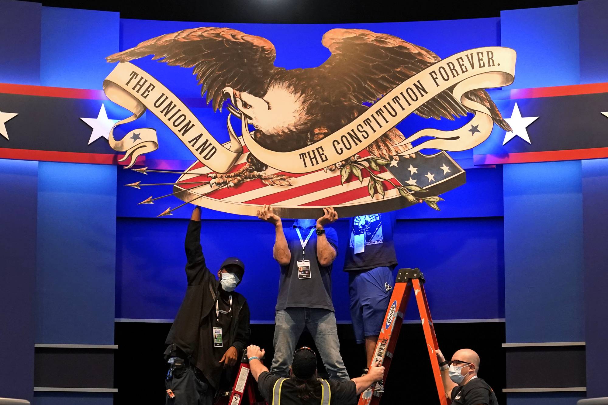 Workers prepare for the first presidential debate at the Sheila and Eric Samson Pavilion in Cleveland, Ohio, on Monday. | AP