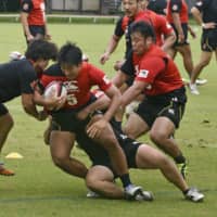 Brave Lupus players train in the western Tokyo city of Fuchu on Sept. 14. | KYODO