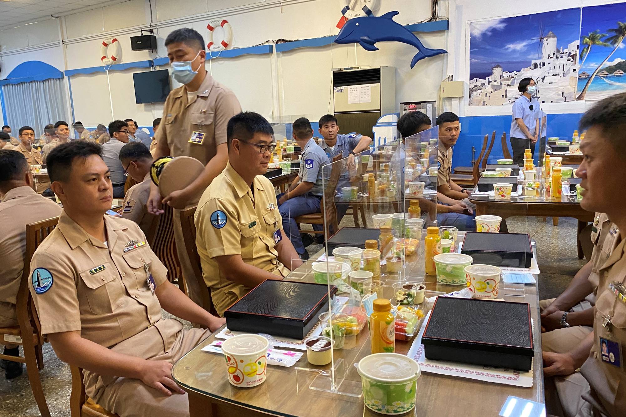 Taiwan navy sailors wait for Taiwan's President Tsai Ing-wen to arrive for lunch with them at the Zuoying naval base in Kaohsiung, Taiwan, on Saturday. | REUTERS