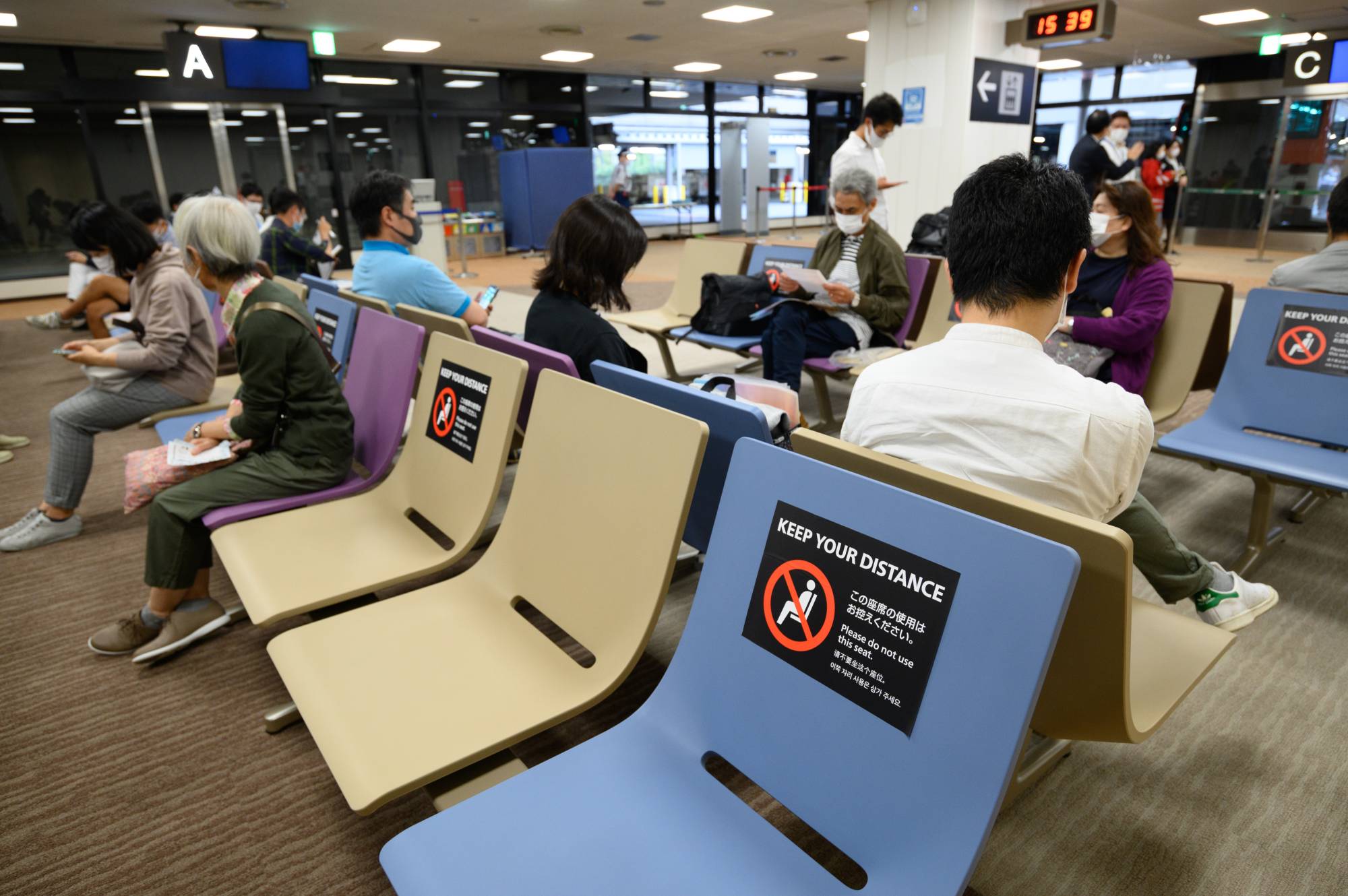 Travelers from among the 159 countries covered by the entry restrictions with higher numbers of infections will be required to meet stricter entry conditions. | BLOOMBERG