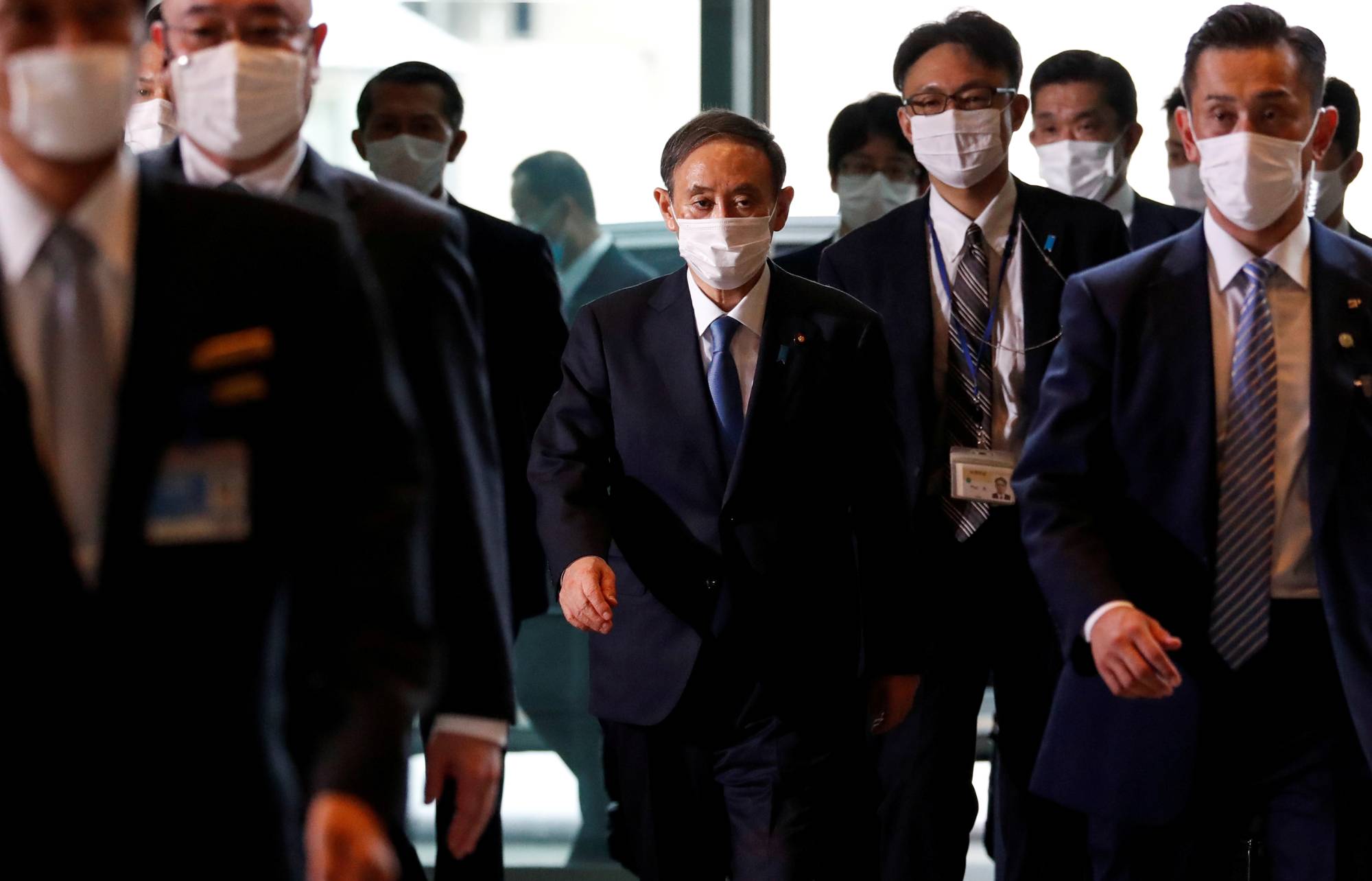 New Prime Minister Yoshihide Suga has continued to pile pressure on the major mobile phone carriers to lower charges. | REUTERS