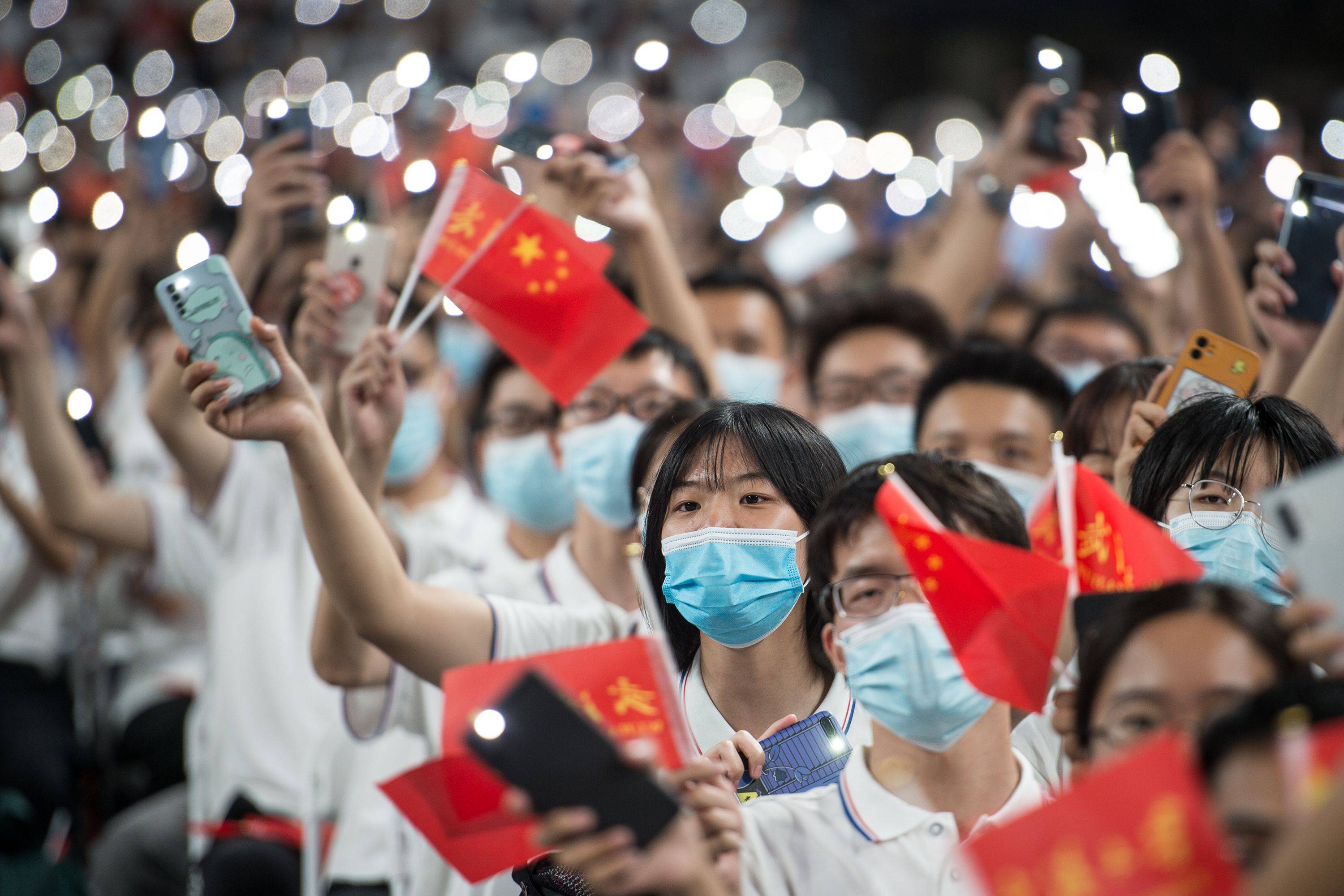 First-year students attend a commencement ceremony at Wuhan University in Wuhan, China, the epicenter of the COVID-19 pandemic, on Sept. 26. | AFP-JIJI