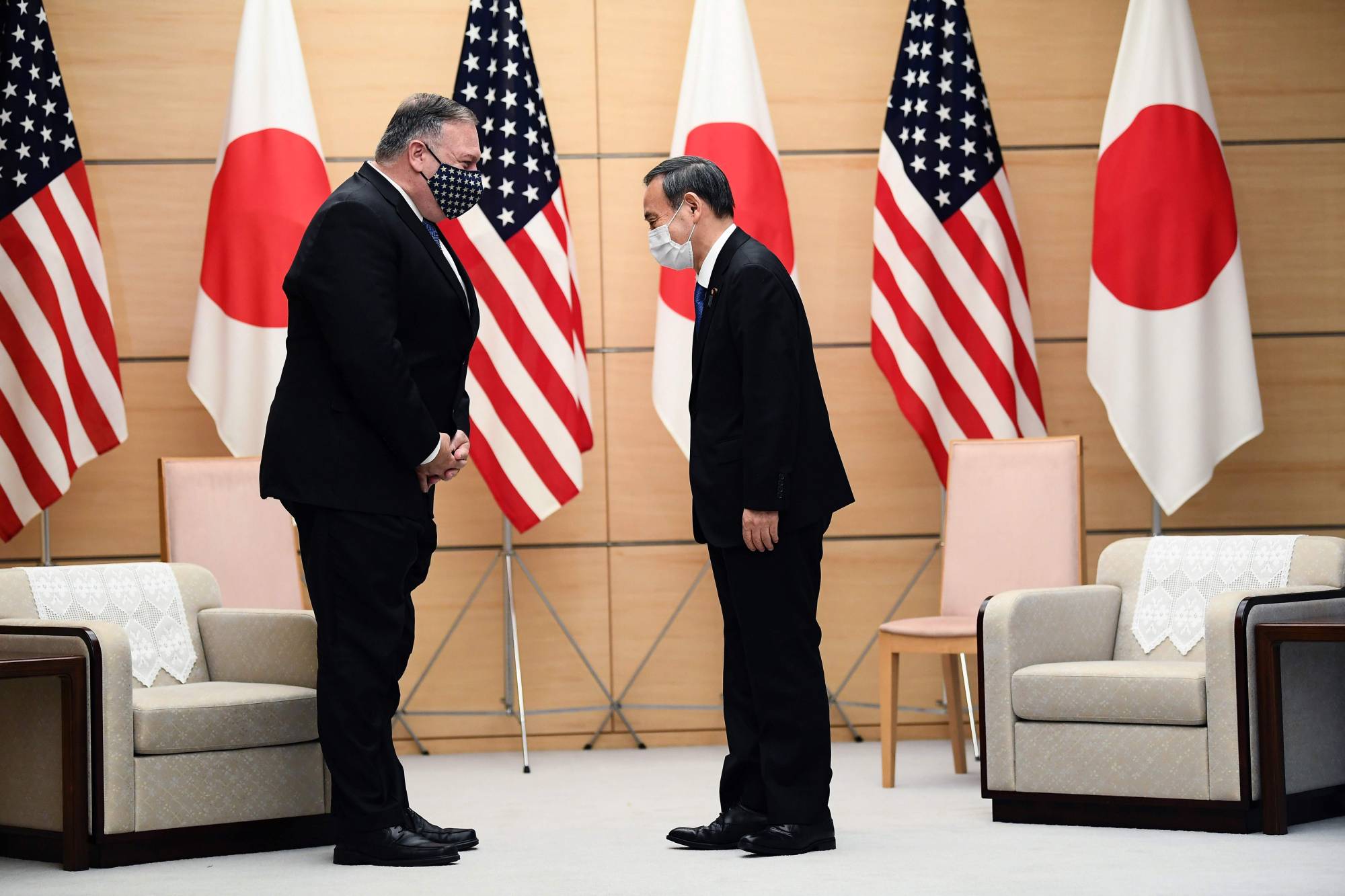U.S. Secretary of State Mike Pompeo and Japanese Prime Minister Yoshihide Suga meet on Oct. 6 in Tokyo. Pompeo has taken a tough line on China, which could help open a space for Japan as a strategic partner of the U.S. | POOL / VIA AFP-JIJI