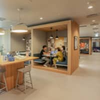 People work at a TKP Corp. shared office in Tokyo. The company sees an opportunity in Tokyo\'s evolving office market. | BLOOMBERG