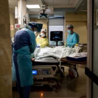 Nearly a third of hospitalized COVID-19 patients experienced altered mental function, ranging from confusion to delirium to unresponsiveness, in one American study. | ERIN SCHAFF / THE NEW YORK TIMES
