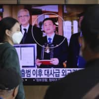 A news program broadcast at Seoul Railway Station on Wednesday shows an image of Jo Song Gil, North Korea\'s former ambassador to Italy. Jo, who had vanished in Italy in late 2018, currently lives in South Korea under government protection, a lawmaker said Wednesday.  | AP